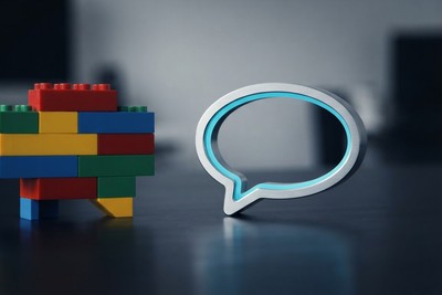 A chat bubble built from colorful toy bricks beside a sleek brushed-metal speech bubble outlined in cyan